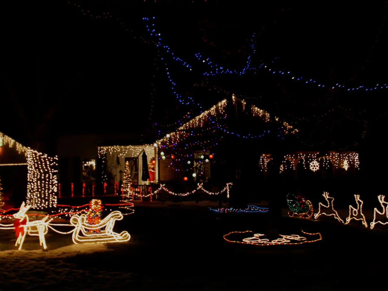 In this image there are some houses decorated with some lights as we can see in the middle of this...