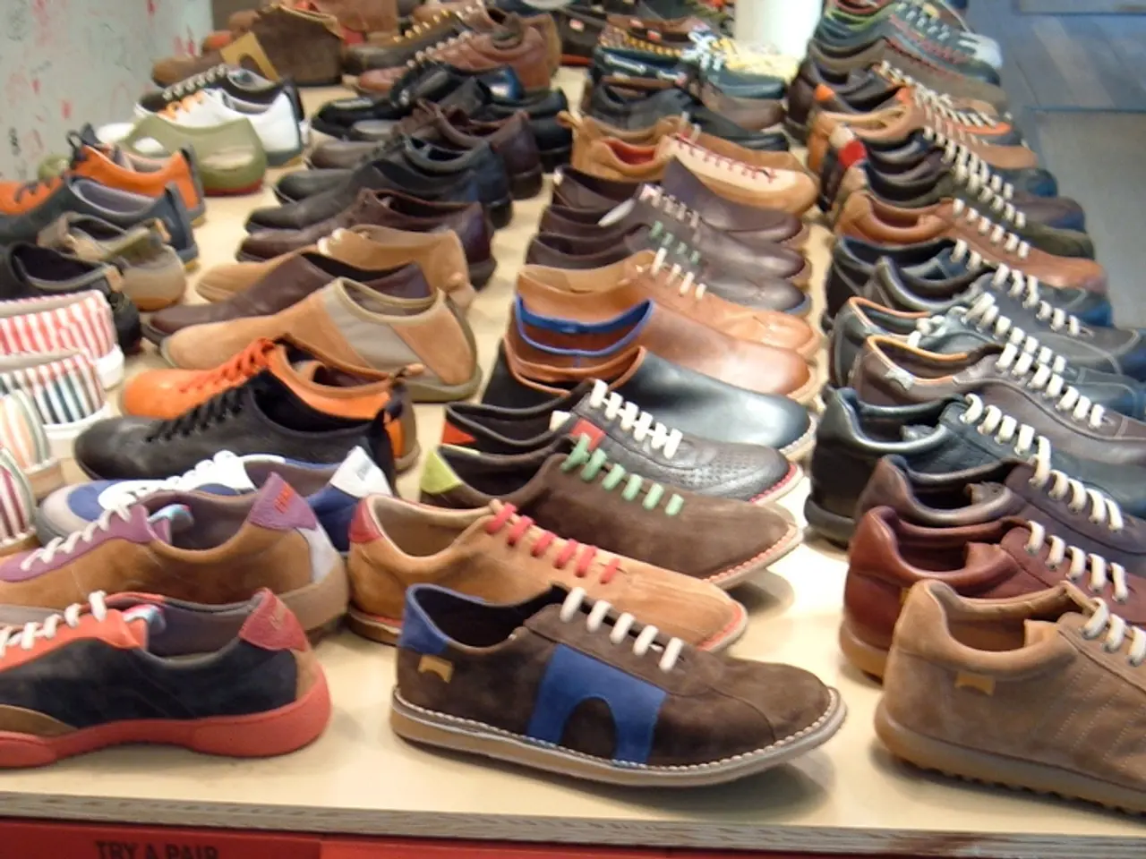 In this picture we can see different type of shoes which are kept on the cotton box. At the top...