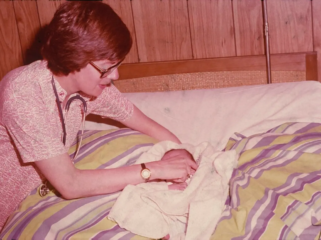 In the picture we can find a woman leaning on the bed and we can see also a bed sheet on the bed,...