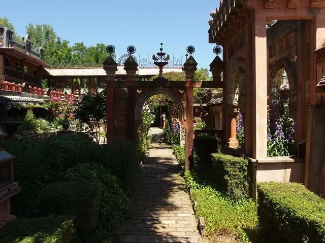 Winter's charm unfolds in the picturesque garden of a Georgian farmhouse, adorned with a dusting of...