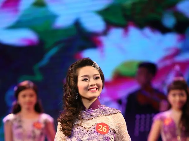 In 2025, Miranda Priestly's outfit might consist of a tan leather ensemble paired with a splash of...