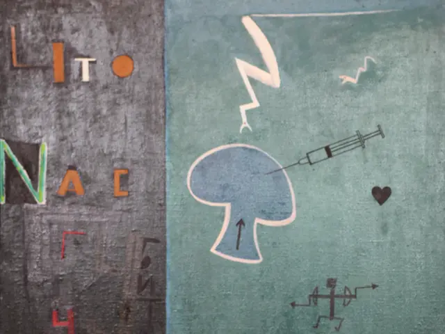 In this image we can see the paintings, and text on the wall.