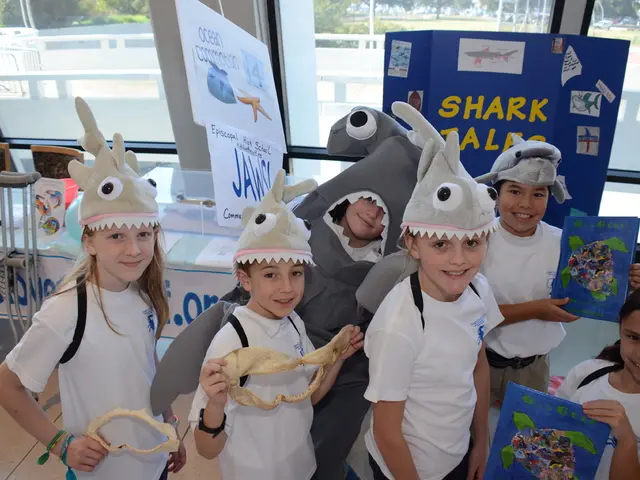 In this image, we can see children standing and wearing caps, we can see a clown and some of them...